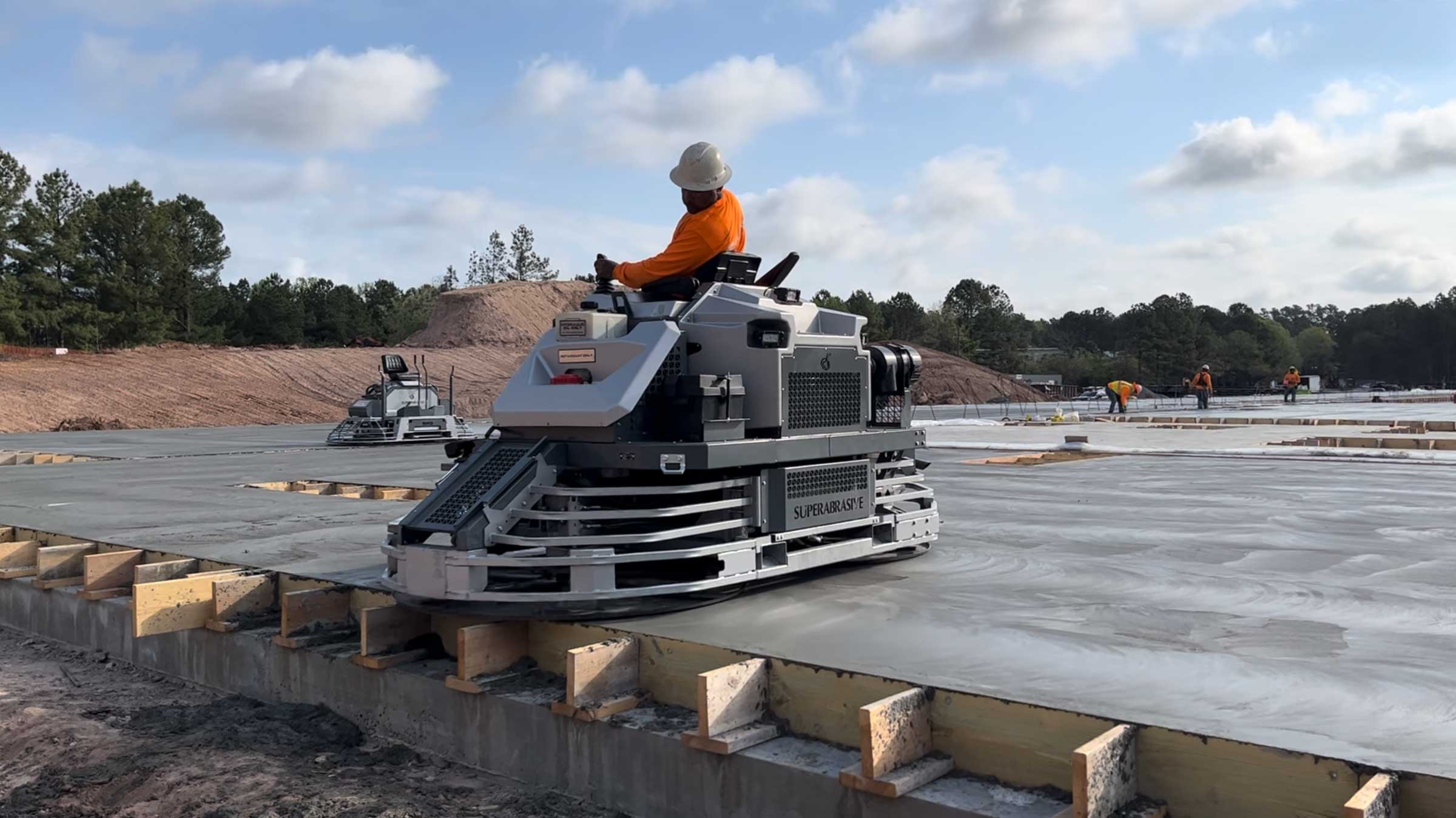 concrete finishing with superabrasive's sp10 10ft hydro rider